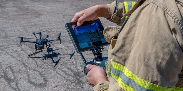 Photo of a first responder using an unmanned aerial system